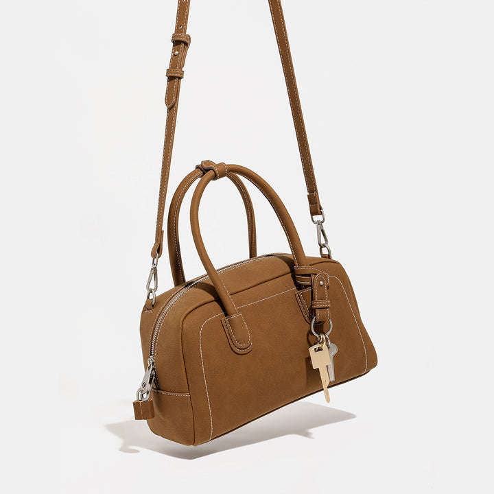 Women's handbag with removable and adjustable shoulder strap