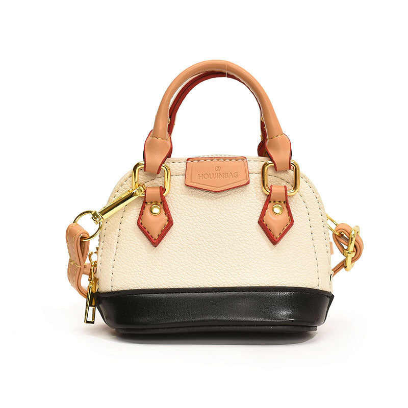 Women’s mini hobo bag made of textured synthetic leather with golden accents