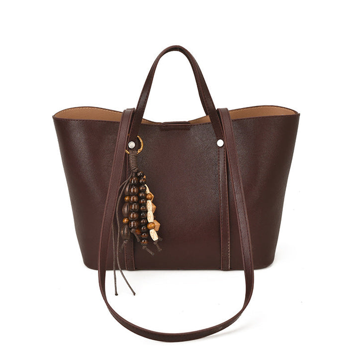 Women's Tote Bag with Modern Design and Unique Beaded Pendant