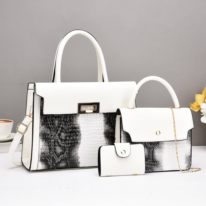 Ladies handbag set with luxurious crocodile leather look and removable clutch