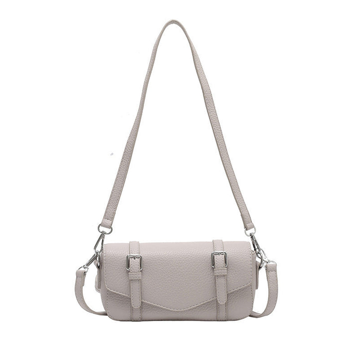 Women's elegant shoulder bag made of textured synthetic leather with adjustable shoulder strap