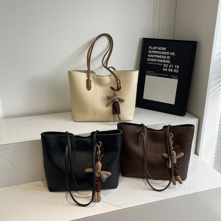 Ladies stylish tote bag with charming keychain