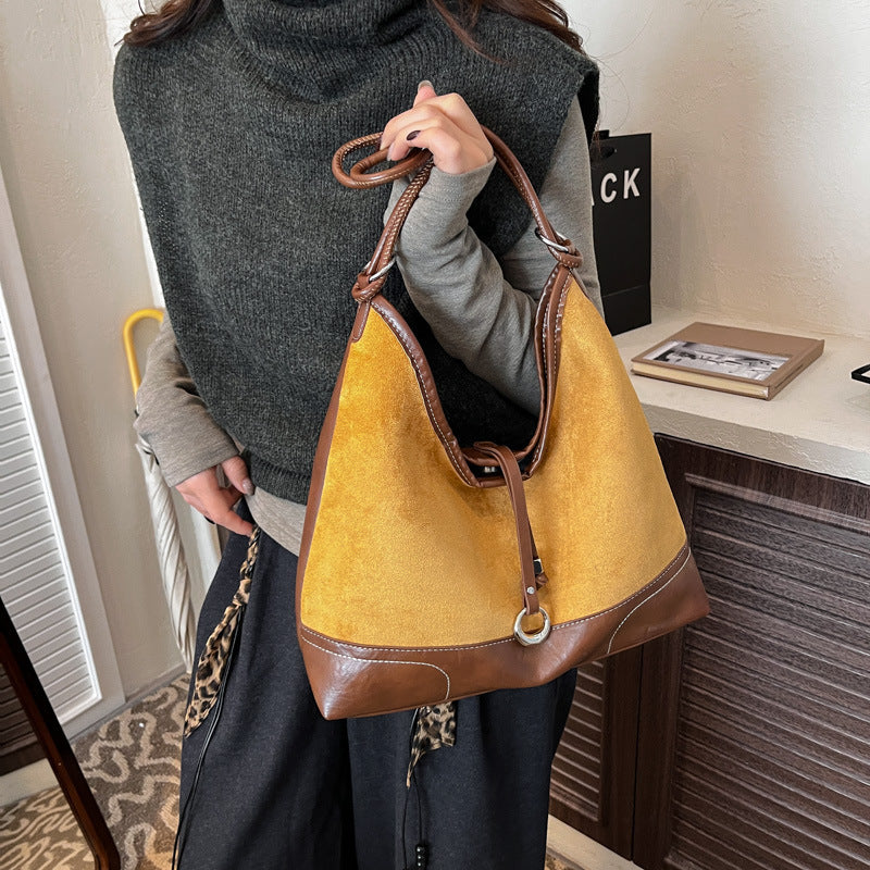 Women's elegant tote bag with authentic suede elements
