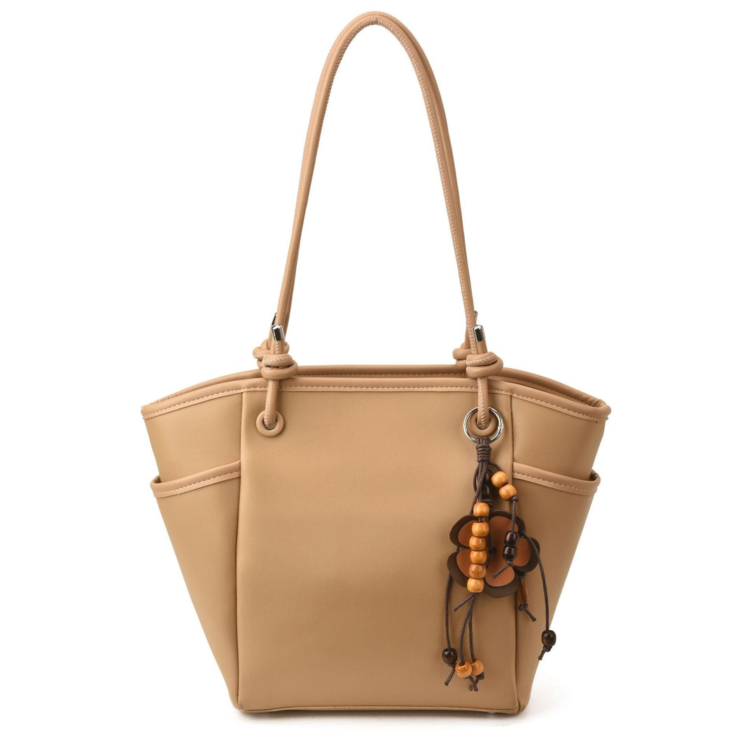 Women's practical shoulder bag with charming appliqués