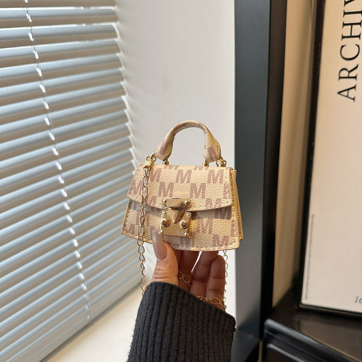 Women's mini handbag with decorative chain strap