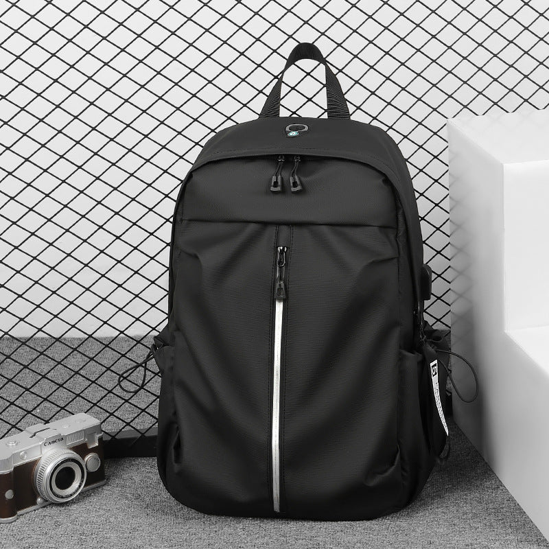 Ergonomic everyday backpack with innovative compartments and waterproof material