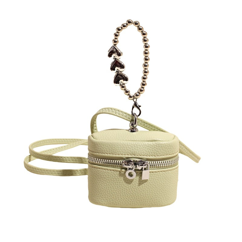 Ladies mini handbag with luxurious chain pendant
