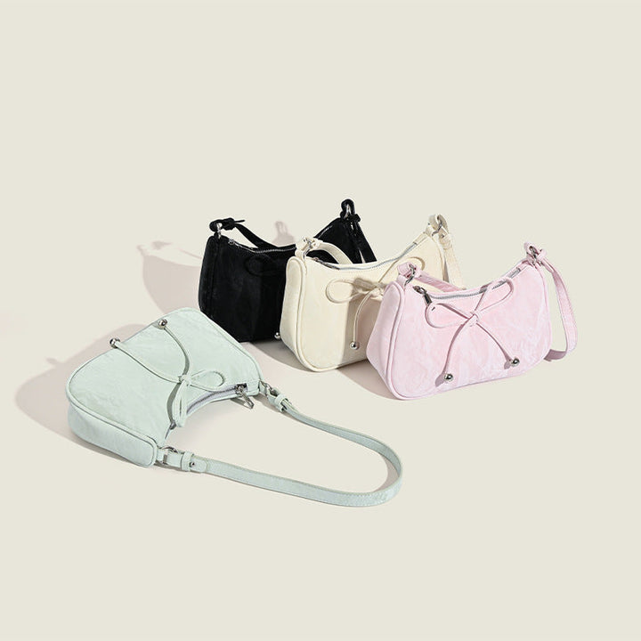 Ladies elegant mini handbag with playful drawstring