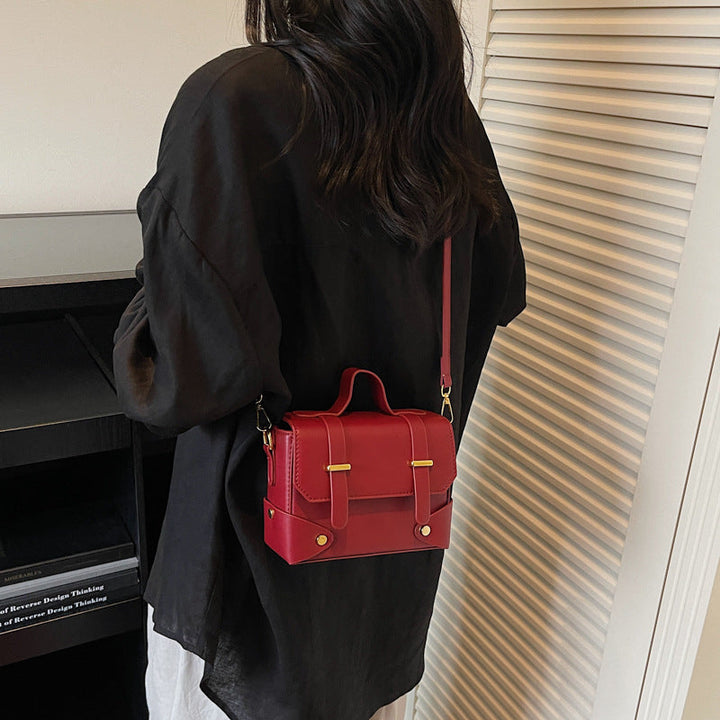 Women's mini handbag with textured design and detachable shoulder strap