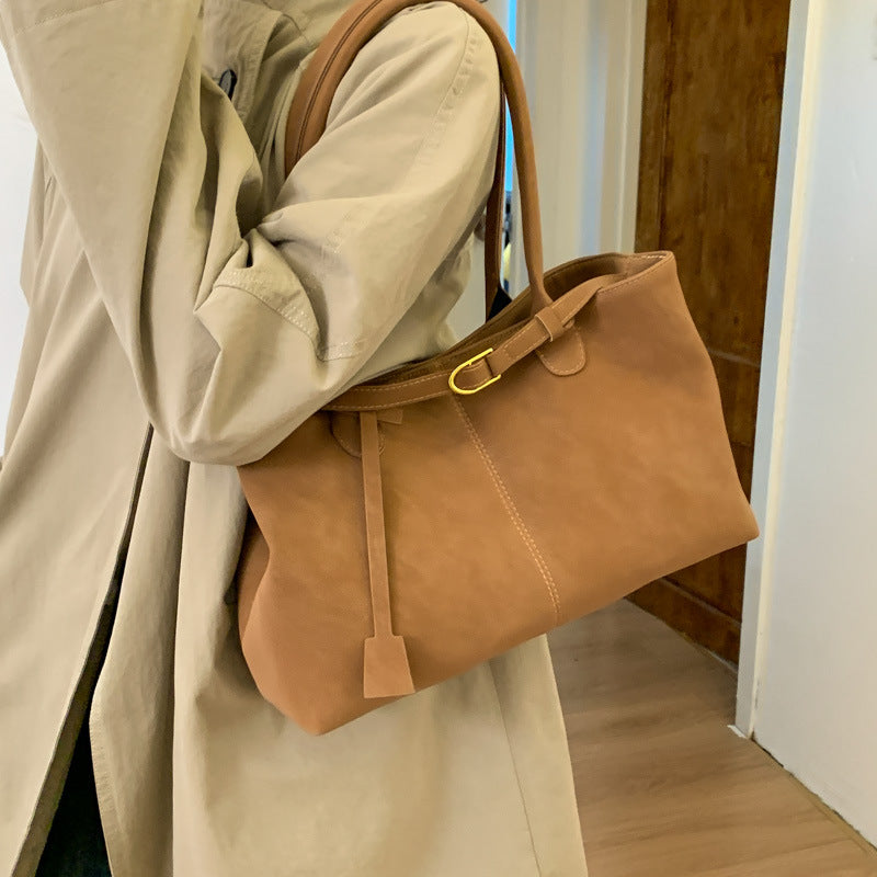 Women's elegant tote bag with shiny detail