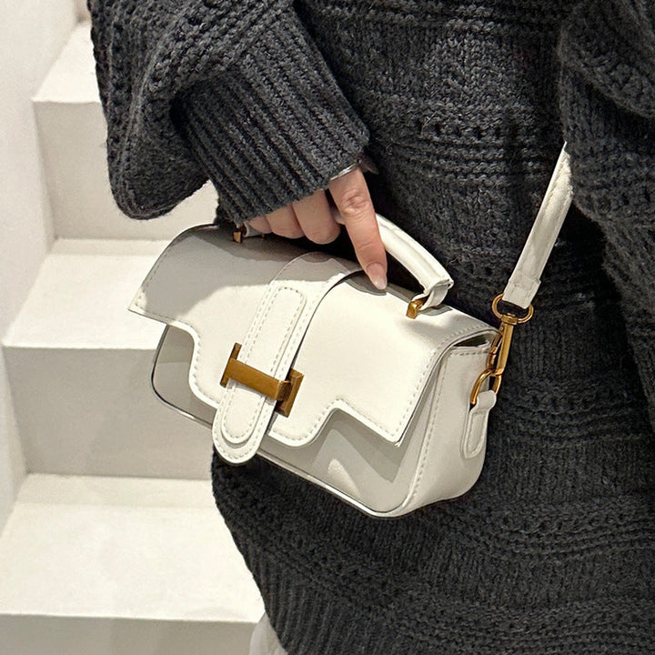 Ladies elegant mini handbag with practical carrying handle and removable shoulder strap