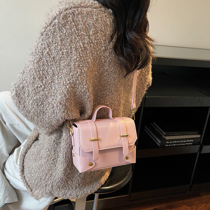 Women's mini handbag with textured design and detachable shoulder strap