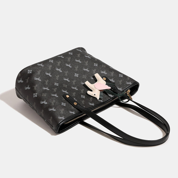 Women's casual tote bag with playful design and detachable pendant