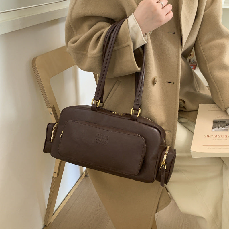 Women's elegant shoulder bag with practical organizer