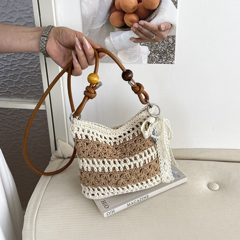 Women crocheted shoulder bag with decorative details