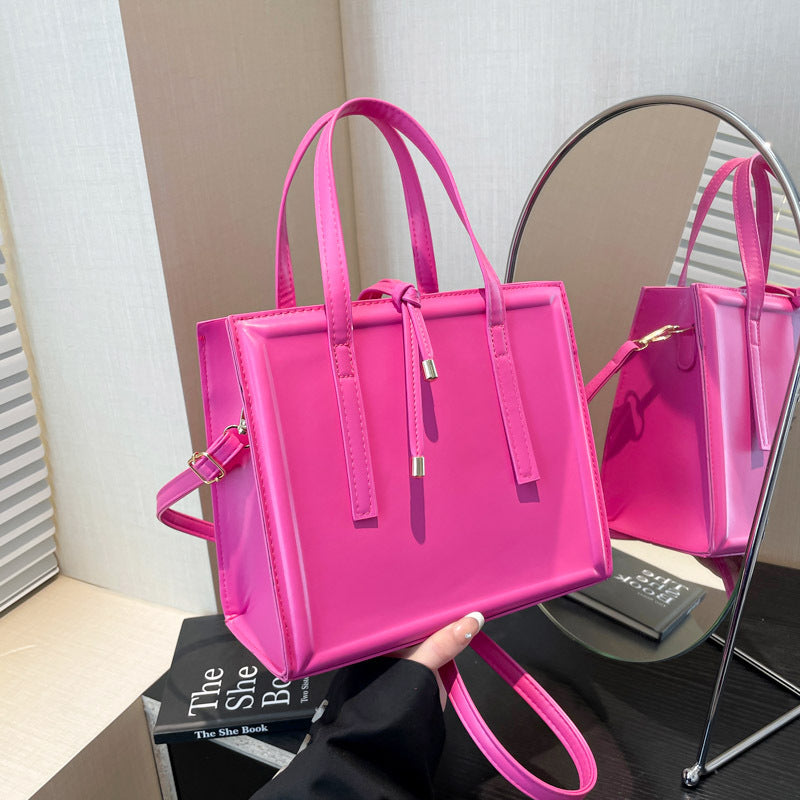 Women's elegant handbag in minimalist design with detachable shoulder strap