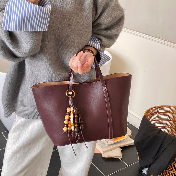 Women's Tote Bag with Modern Design and Unique Beaded Pendant