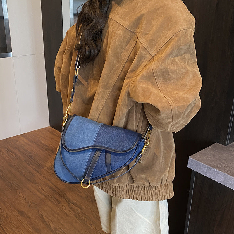 Women’s shoulder bag made of durable denim with adjustable shoulder strap