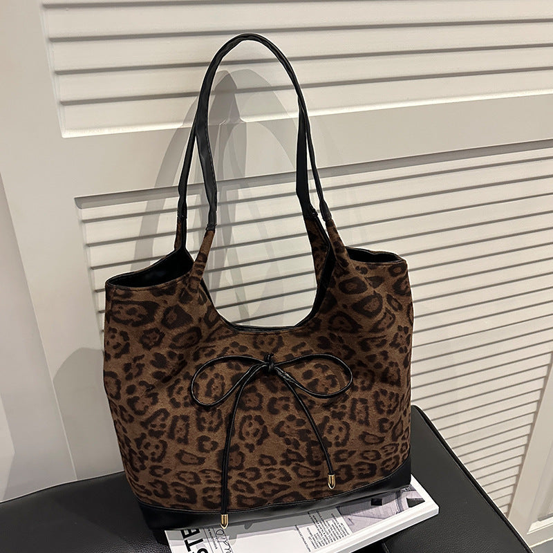 Women's tote bag with stylish leopard pattern and adjustable drawstring