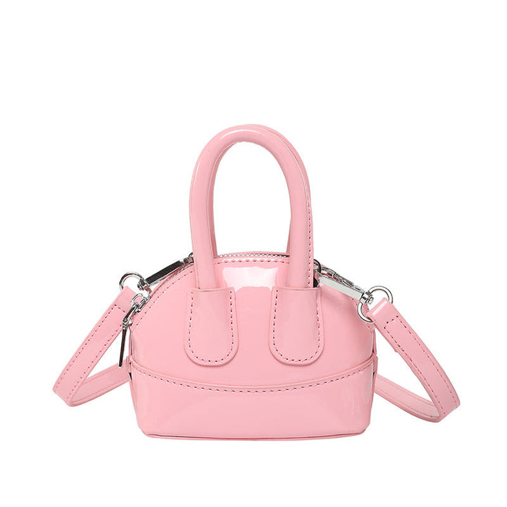 Ladies mini handbag with elegant glossy finish and removable shoulder strap