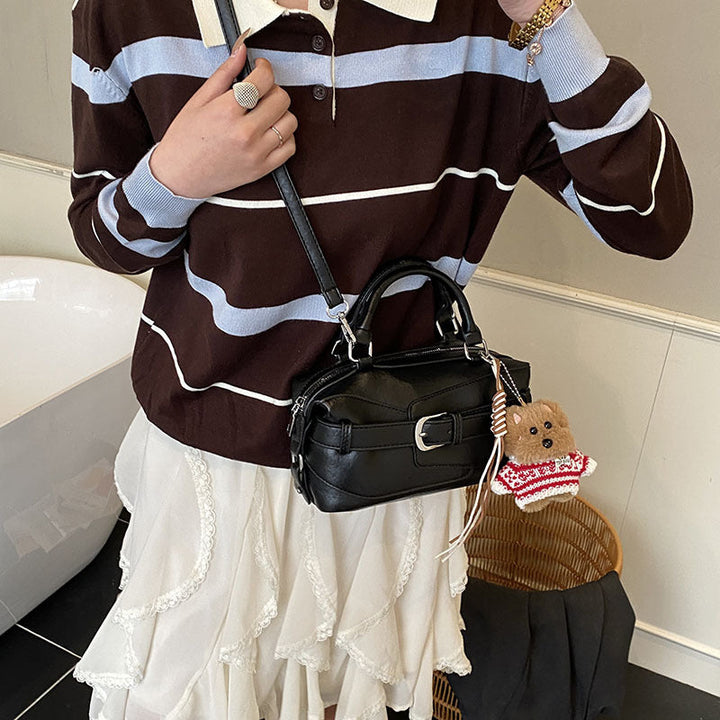 Women's mini handbag with charming animal pendant