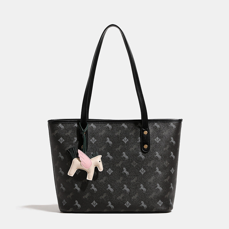 Women's casual tote bag with playful design and detachable pendant
