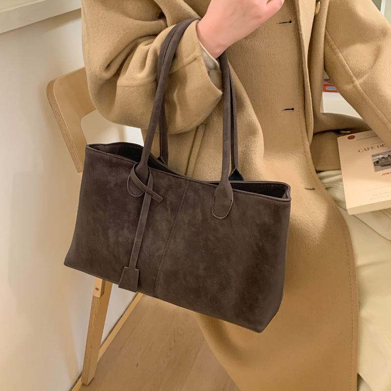 Women's elegant tote bag with shiny detail