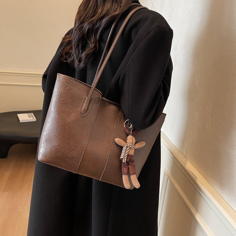 Ladies stylish tote bag with charming keychain