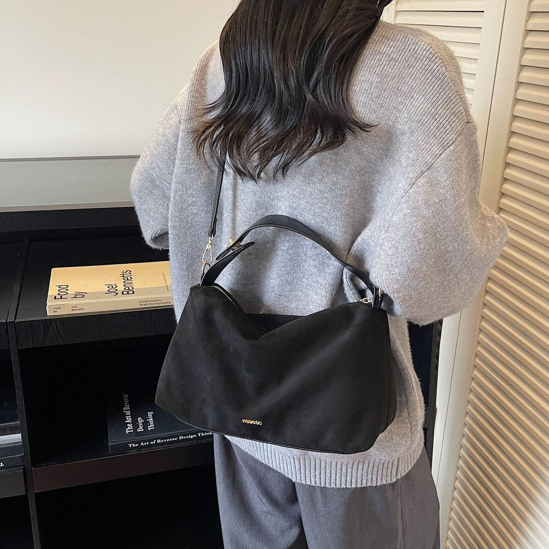 Women's practical shoulder bag made of soft suede