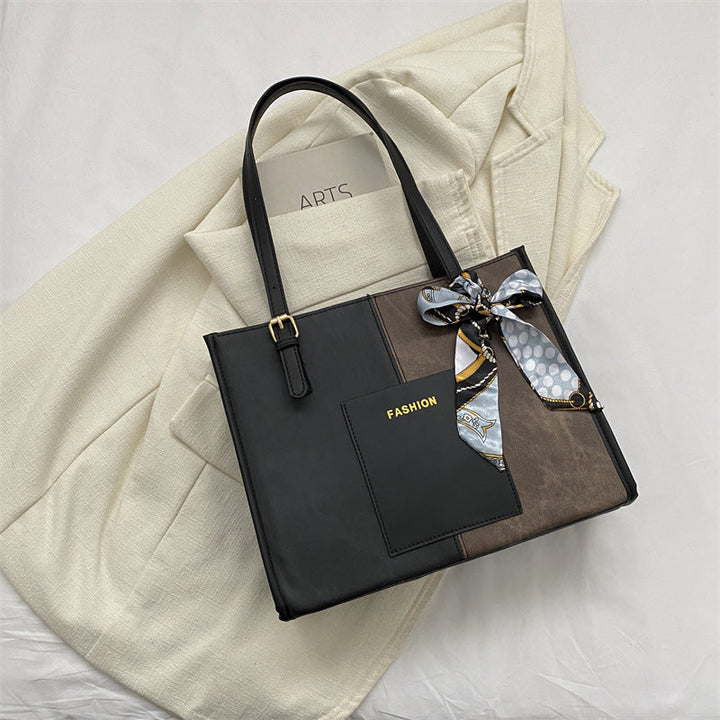 Women's tote bag with fashionable design and decorative silk ribbon
