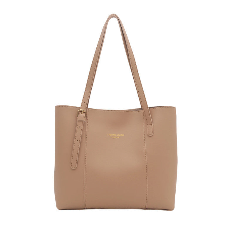 Women's elegant tote bag made of high-quality faux leather with distinctive design