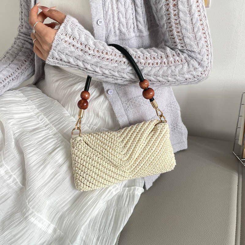 Ladies fashionable braided shoulder bag with wooden handle