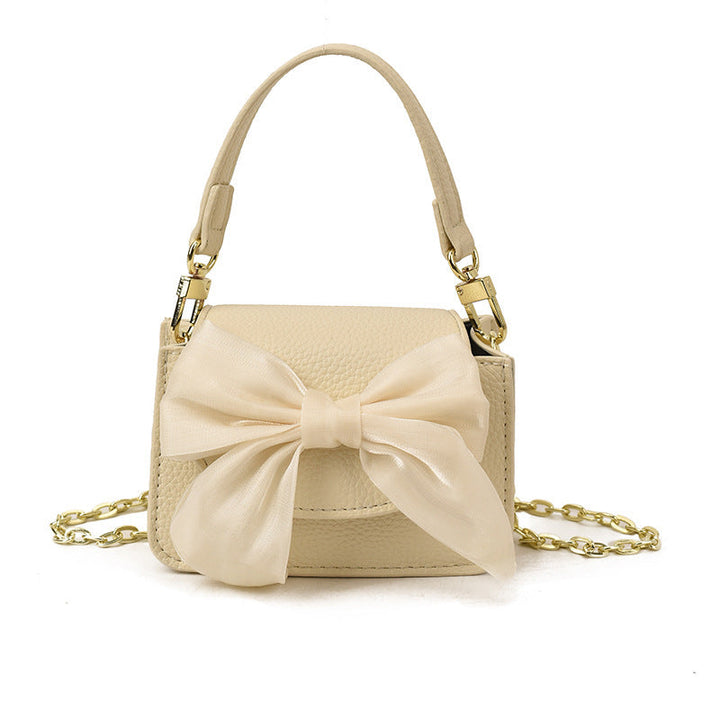 Ladies mini handbag with decorative bow design