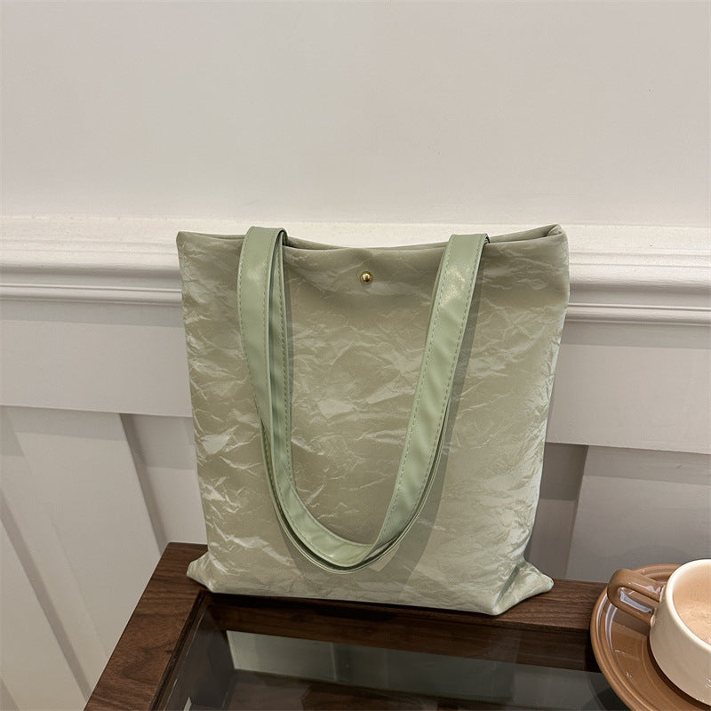 Women's tote bag made of high-quality synthetic leather with a textured surface