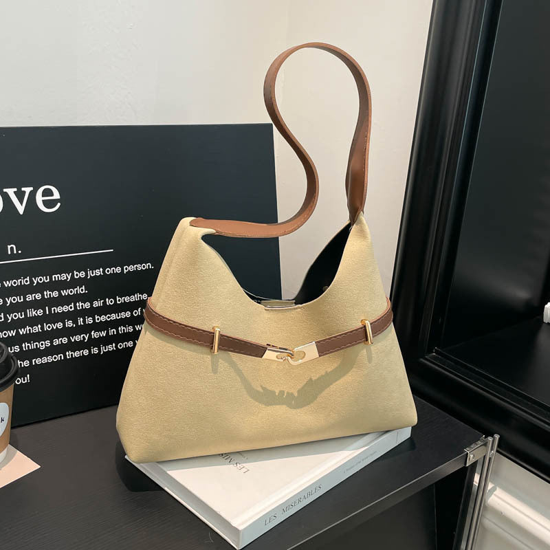 Ladies fashionable suede shoulder bag with contrasting strap