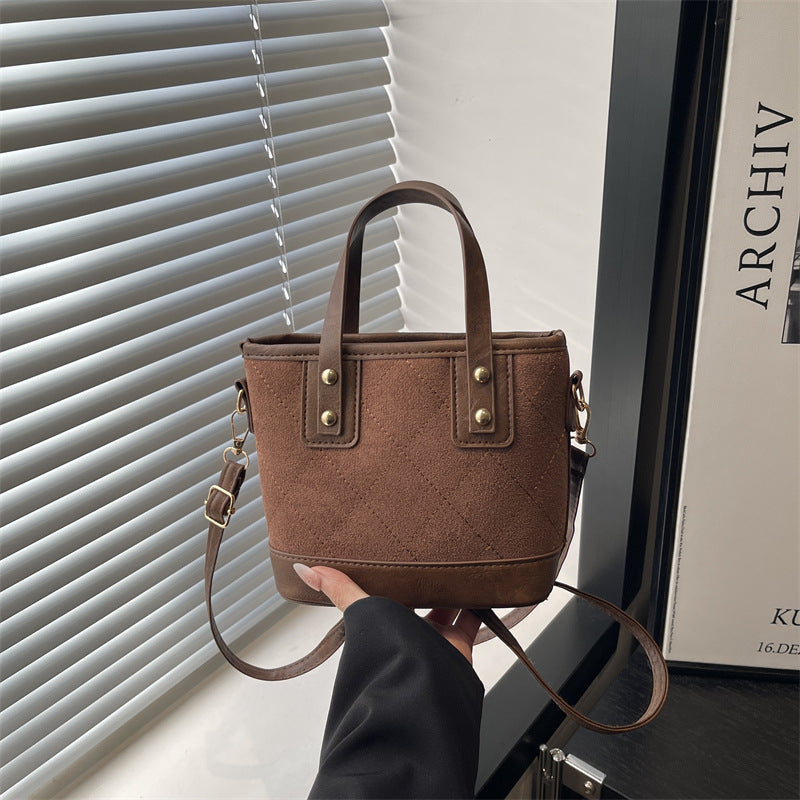 Women's elegant mini bucket bag with detachable shoulder strap