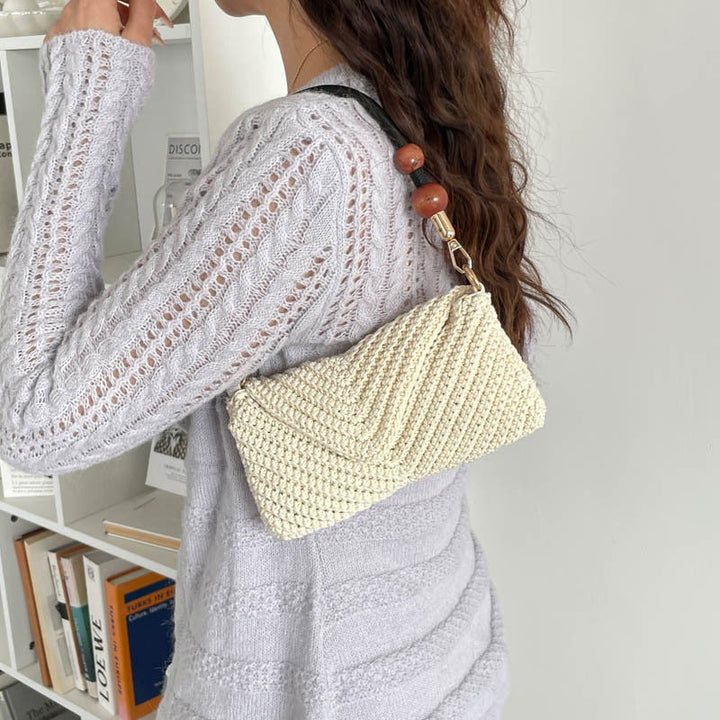 Ladies fashionable braided shoulder bag with wooden handle