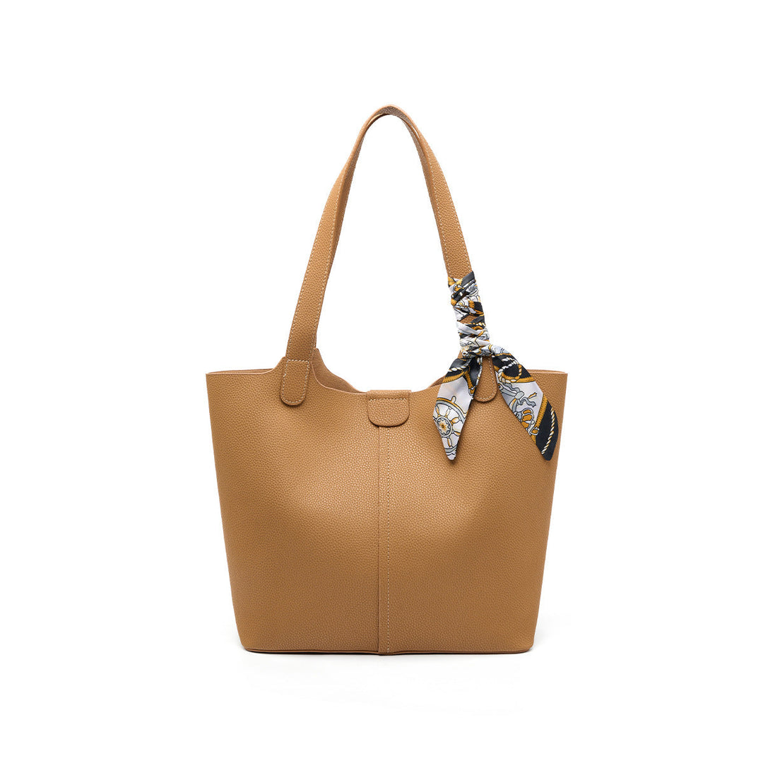 Women’s fashionable tote bag with detachable bow accessory