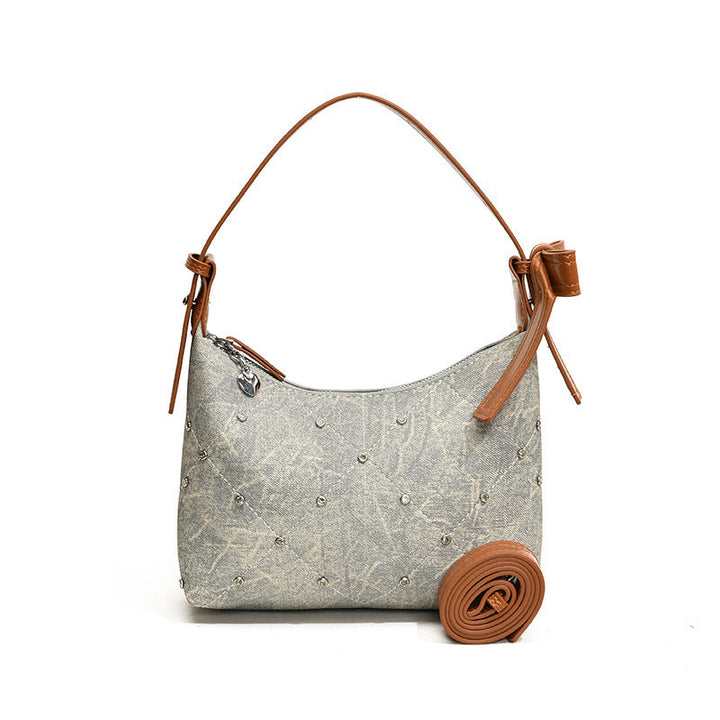 Ladies fashionable shoulder bag with sparkling appliqués