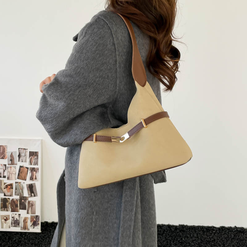 Ladies fashionable suede shoulder bag with contrasting strap