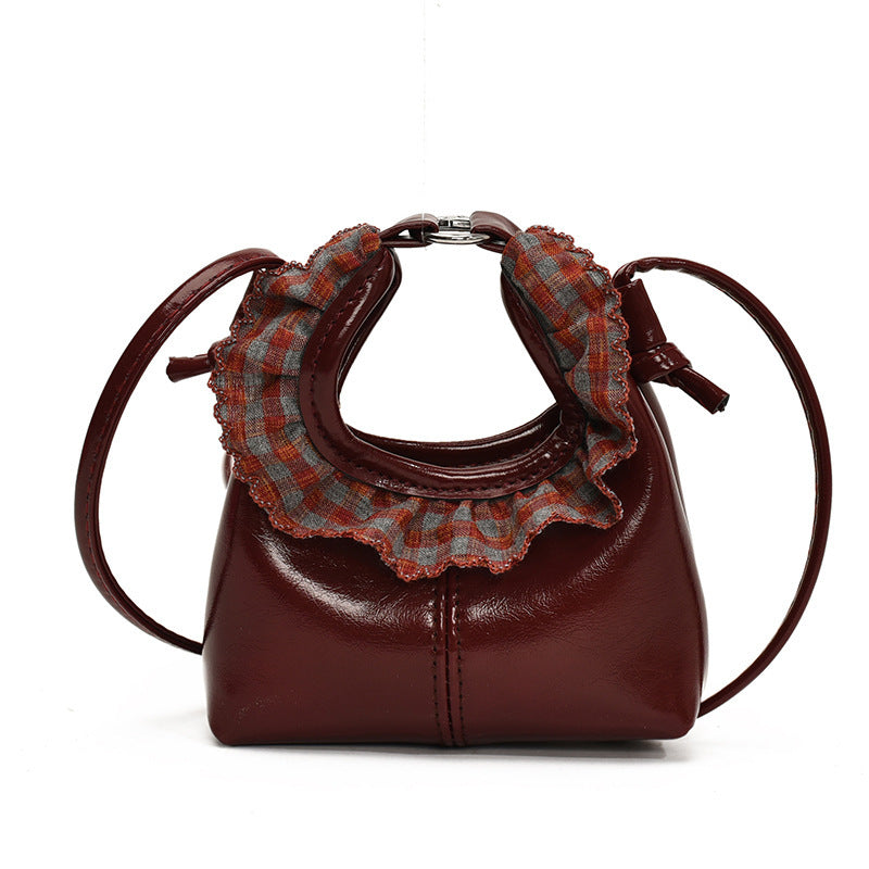 Women’s mini handbag with trendy ruffle design