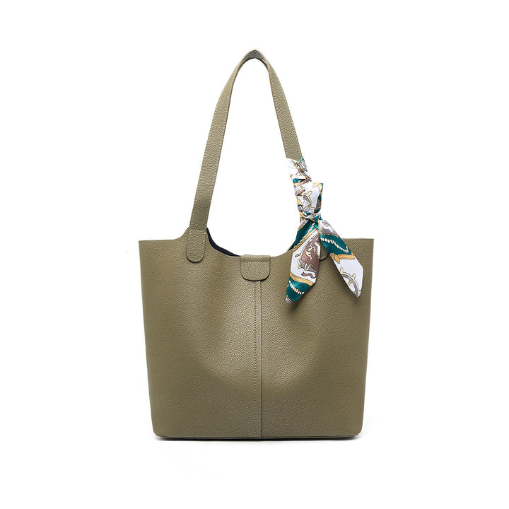 Women’s fashionable tote bag with detachable bow accessory