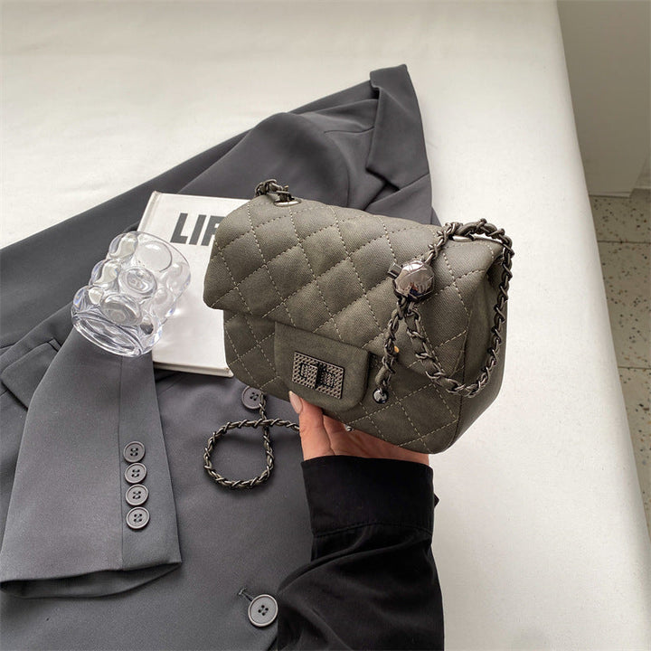 Women's mini handbag with padded design and elegant chain strap