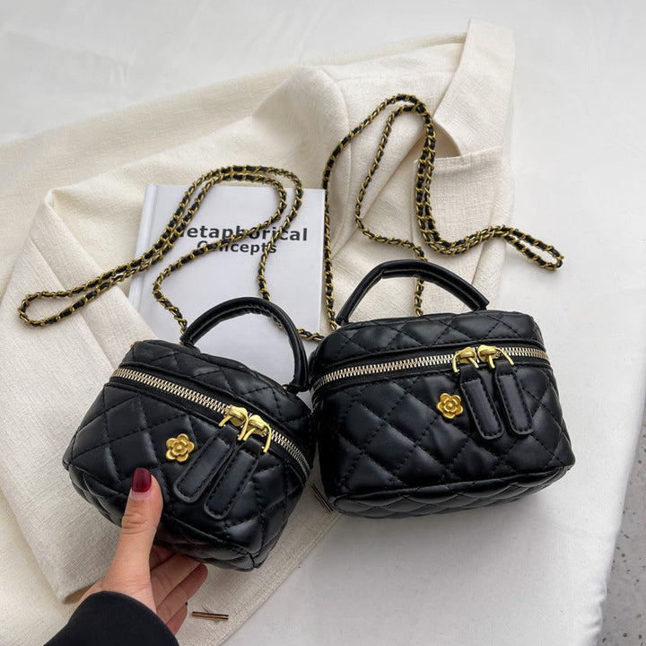 Women's mini bag in elegant quilted design with golden accents