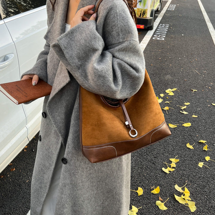 Women's elegant tote bag with authentic suede elements