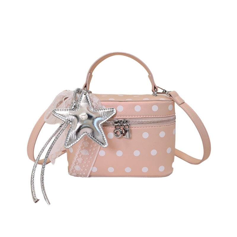Women's mini handbag with playful design and elegant accents