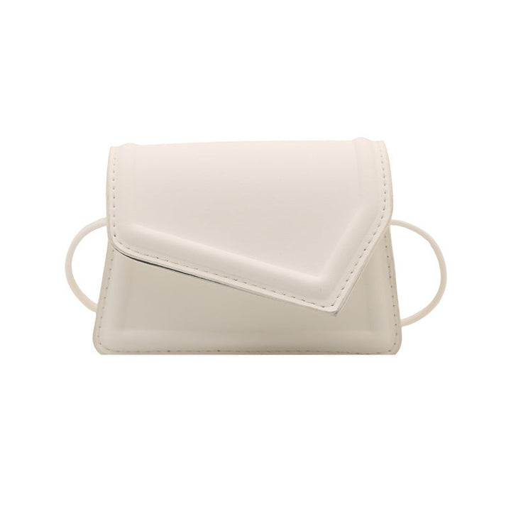 Women's mini handbag with elegant clasp closure technique