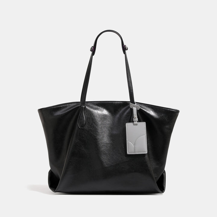 Women high-quality tote bag made of soft synthetic leather with textured design
