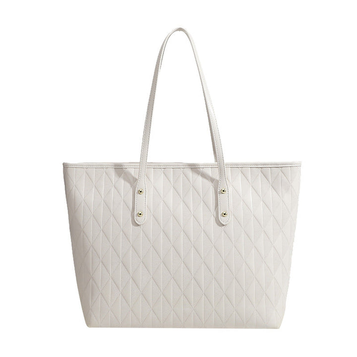 Women's tote bag with elegant diamond design and practical inner compartments