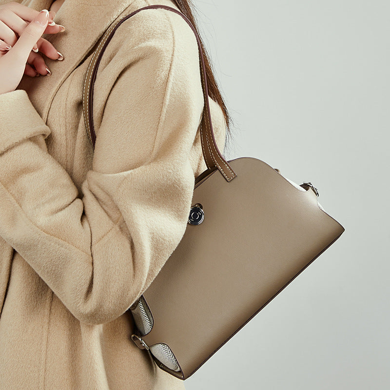 Women's tote bag with stylish design and practical compartments